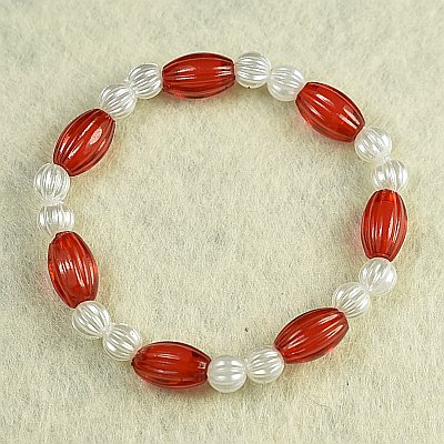 Гривна на ластик с червени елипси PICTURE OF ITEM 1360